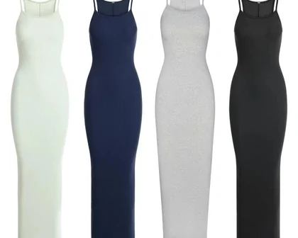 A selection of sleeveless dresses in light and dark colours